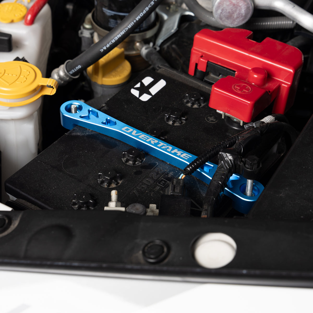 Overtake Battery Tie Down